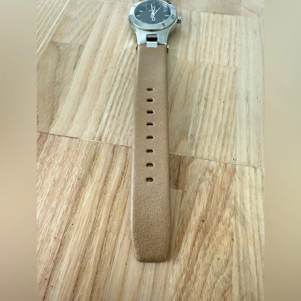 DKNY ladies silver tone tan leather dress watch NEW BATTERY